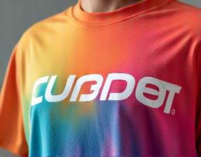 Closeup of a vibrant printed t-shirt with company logo