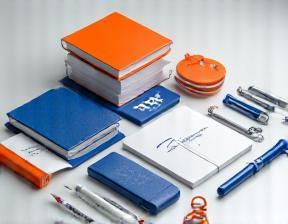 Collection of branded promotional products with printed company logos