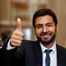 Client Kadir Coşkun giving thumbs up at an event